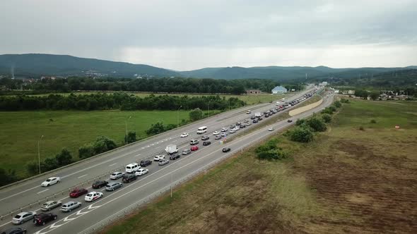 Aerial View of Freeway Busy Rush Hour Heavy Traffic Jam Highway alt