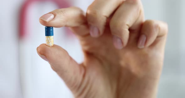 Doctor Holds Medical Medicine Capsule Slow Motion  Movie alt