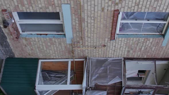 Vertical Video of a Wartorn Building in Ukraine alt