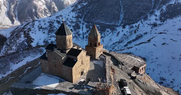 Aerial view of Gergeti Trinity Church, Tsminda Sameba in Kazbegi. Georgia 2022 alt