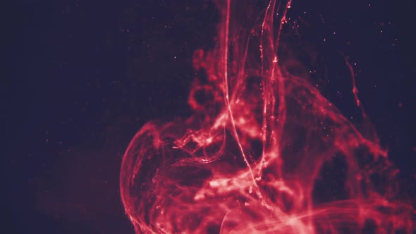 Abstract Red Ink Flowing in Water alt