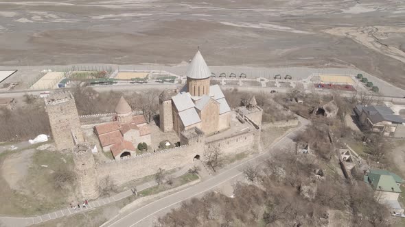 Aerial view of old Ananuri Fortress with two churches and picturesque view on river. Georgia 2021 alt