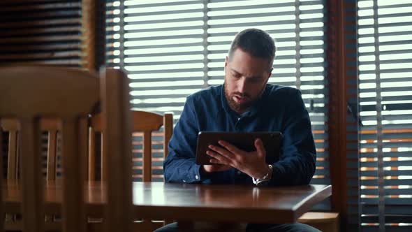 Businessman checking bitcoin price chart on digital exchange on mobile phone screen, cryptocurrency alt