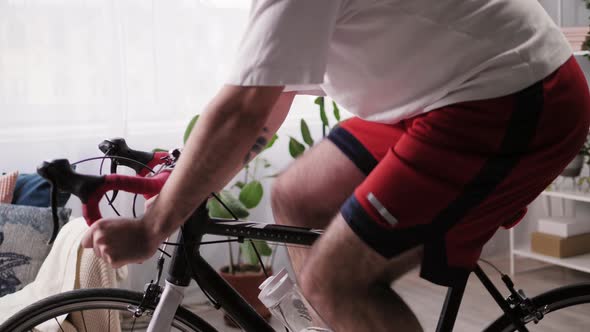 Sportsman Riding Bicycle Home Gym alt