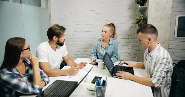 Team Working in Loft Office