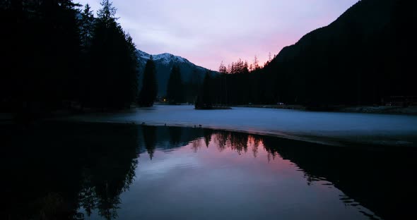 Frozen lake and sunset, slowmotion
