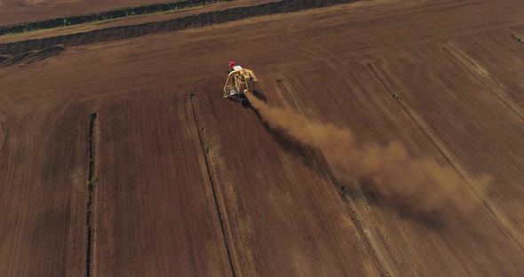 Peat Harvesting Machine Extracting and Collecting in Drained Bog Aerial View alt