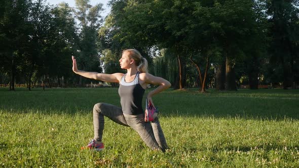 Beautiful Girl Doing Exercises Outdoors alt
