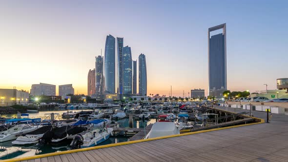 Al Bateen Marina Abu Dhabi Day to Night Timelapse with Modern Skyscrapers on Background alt