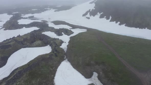 The Magma Stone Field of Gorely Volcano Covered with Fog