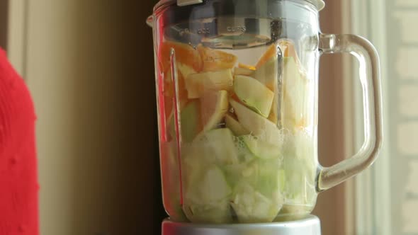 Fruits Mix In Blender Making Smoothie alt