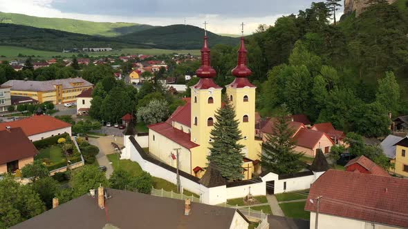 Aerial view of the church in the village of Divin in Slovakia alt