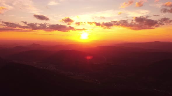 Epic Aerial Flight in the Clouds at Sunset