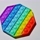 Colorful pop it toy in form of hexagon. View from above on gray background. Rotation. Isolate. - VideoHive Item for Sale