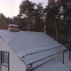 Drone shot of new white modern residential house at winter near the forest 15 - VideoHive Item for Sale