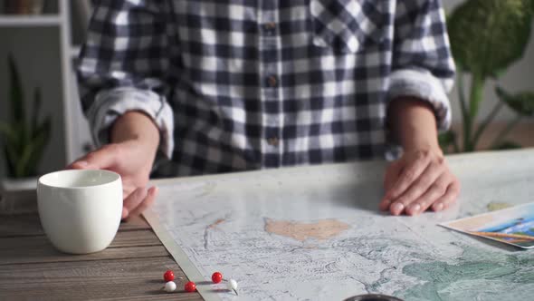 Young Woman Traveler Talking To Her Husband Discussing Travel And New Adventures Drinks A Cup alt