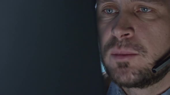 Man in Call Centre Helping Customer alt