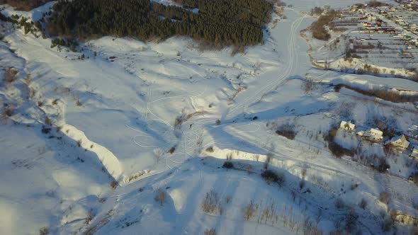 Snowmobile Tracks In Countryside alt