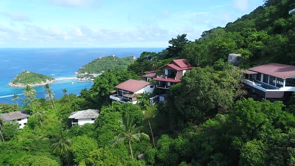 An aerial  view of villas in the mountains on the paradise island Koh Tao, Thailand alt