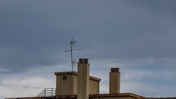 Residential Building Roof with Chimney and Antenna