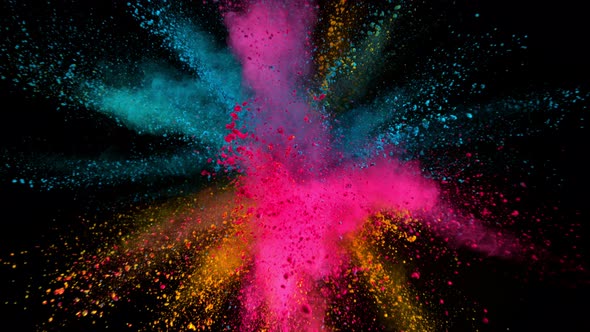 Super Slowmotion Shot of Color Powder Explosions Isolated on Black Background at 1000Fps alt