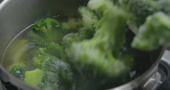 Frozen broccoli cooking slow motion