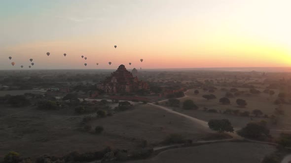 Aerial view of hot balloons in the Old Bagan temple site. alt