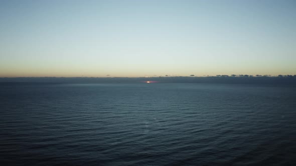 Sun Rising in the Ocean alt