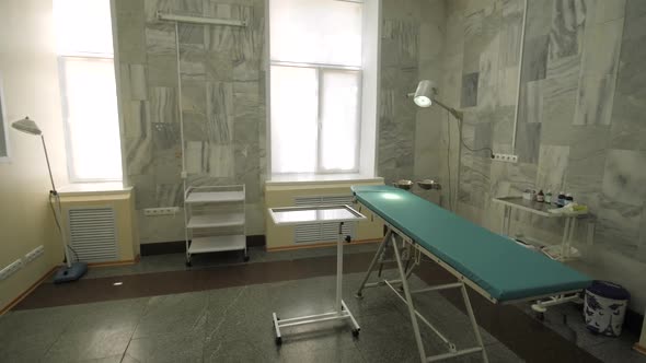 Hospital room in a clinic. Empty Medical bed. Operating room. Medical devices, equipment. alt