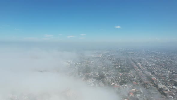 Lowering Below The Clouds