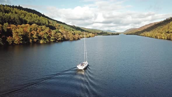 Flying Through the Great Glen Above Loch Oich Towards Loch Ness Behind a White Motor Yacht alt