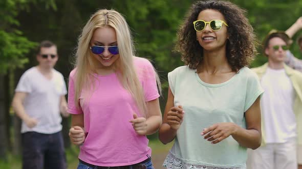 Group of Young Attractive People Dancing in Slow Motion, Celebration of Life alt