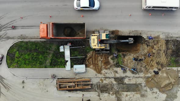 Construction of the road in Krasnodar. Pipe laying in Krasnodar. alt