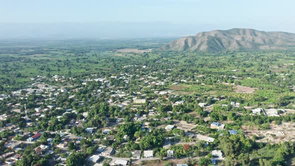 Aerial view of remote Neiba in rural Dominican Republic, high angle alt