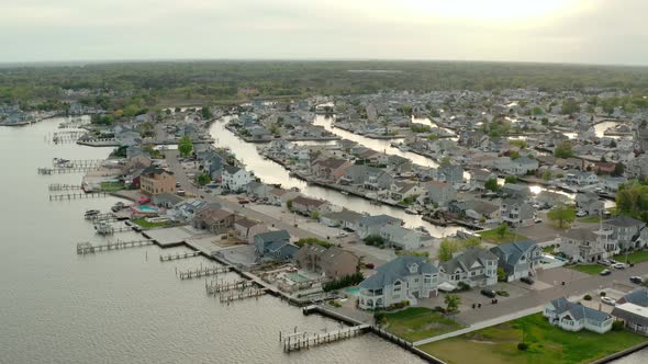 Aerial Drone View of Local Residential Suburb of River in View of Distant Toms River alt
