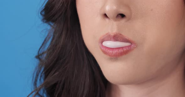 Beautiful woman with gum alt