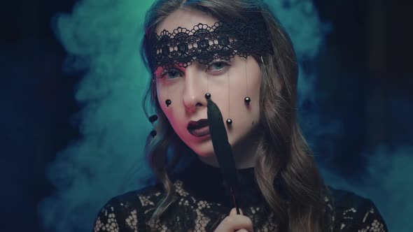 Mystical Female in Black Attire Looking at the Camera Halloween Feast of All Saints Portrait of a alt