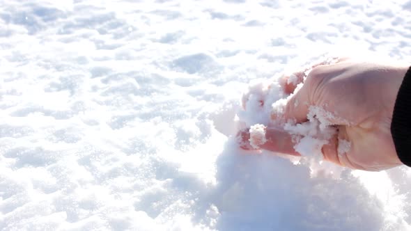 Human Hand and Snow