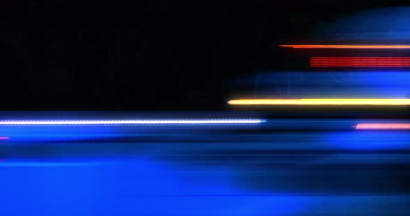 Super fast car night traffic lights.