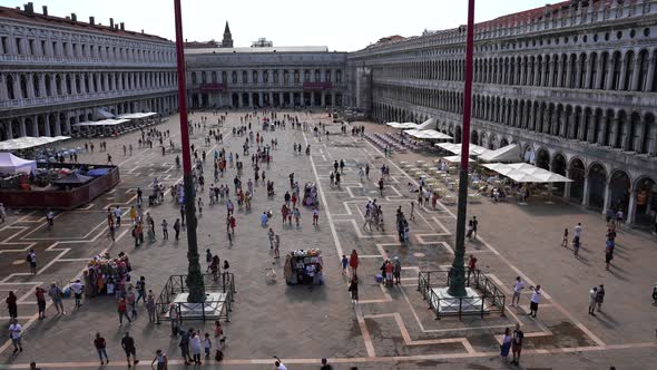 People Walking Around St Mark's Square in Venice on a Sunny Summer Day alt