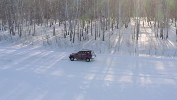 Modern car moves snow road  alt