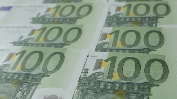 Slow tilt  currency of EU in 100  denominations close-up  4K 2160p 30fps UltraHD footage - Shallow D alt