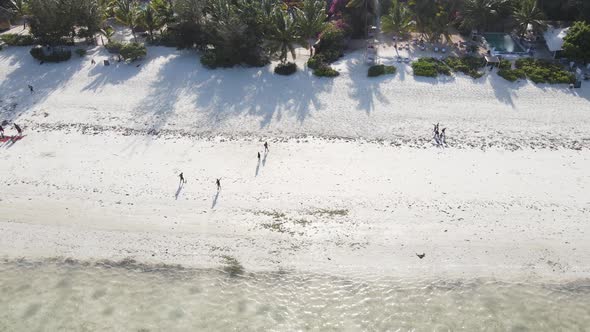 Zanzibar Tanzania  People Play Football on the Beach Slow Motion alt