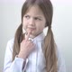 Schoolgirl Was Thoughtful Then Raised Index Finger Up with Great New Idea - VideoHive Item for Sale