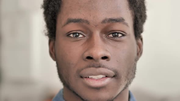 Shocked African Man Face Close Up alt