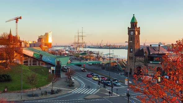 Day to Night Time Lapse of Hamburg Harbor with Landungsbruecken, Hamburg, Germany alt
