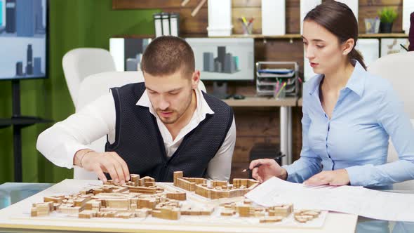 Team of Architect Working the Urbanism of a Modern Town alt