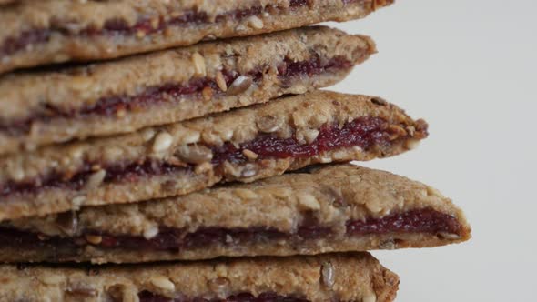 Tasty chrono food snack on white background 4K 2160p 30fps UltraHD tilting footage - Close-up of ras alt