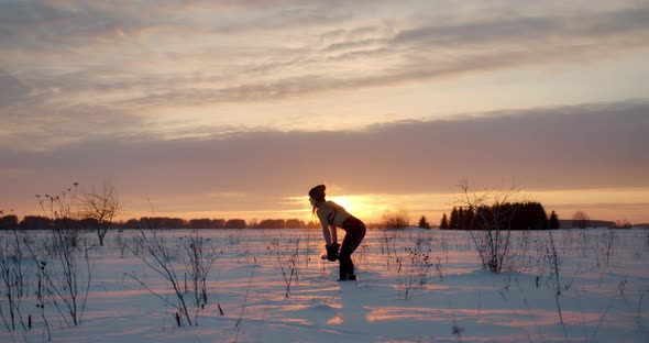 Boiling Water Challenge Woman in Bikini Throw Hot Water in Freezing Winter Air alt