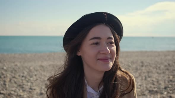 Happy Young Lady Is Enjoying Warm Weather in Sunny Beach, Close-up of Face alt
